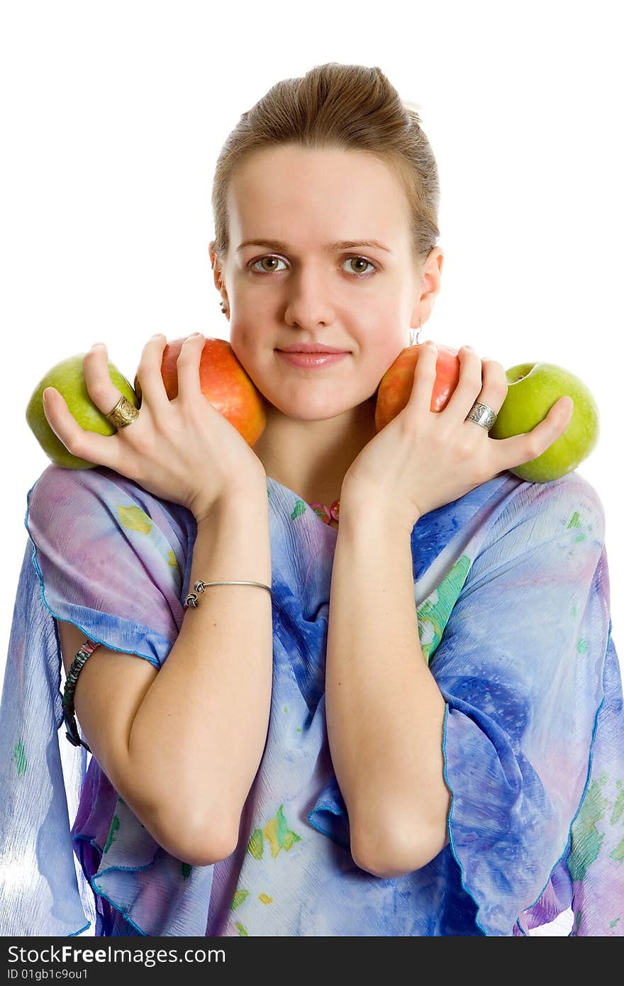 Girl with an applle. Isolated on white.