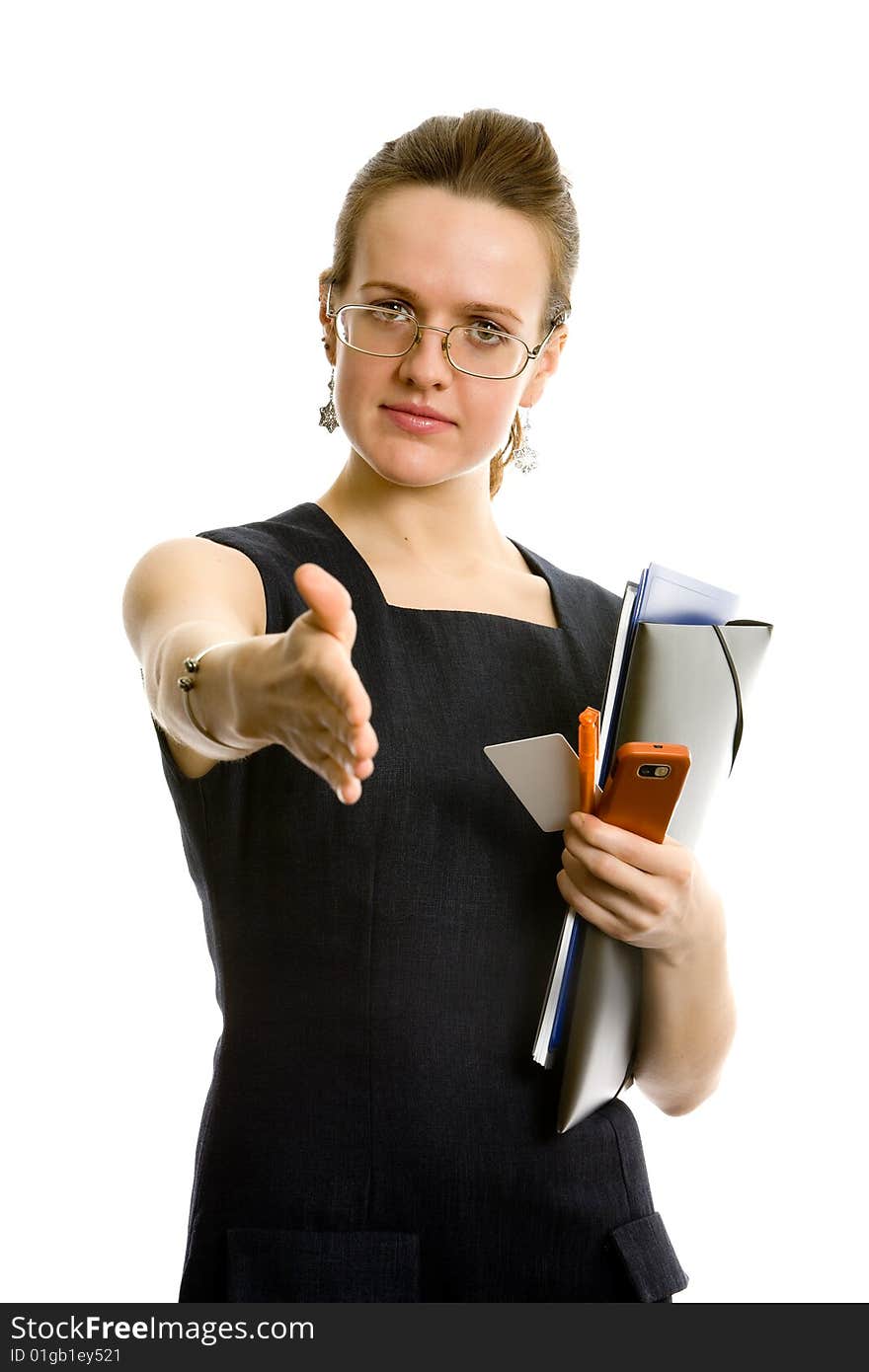 Beautiful young businesswoman with folders. Isolated on white