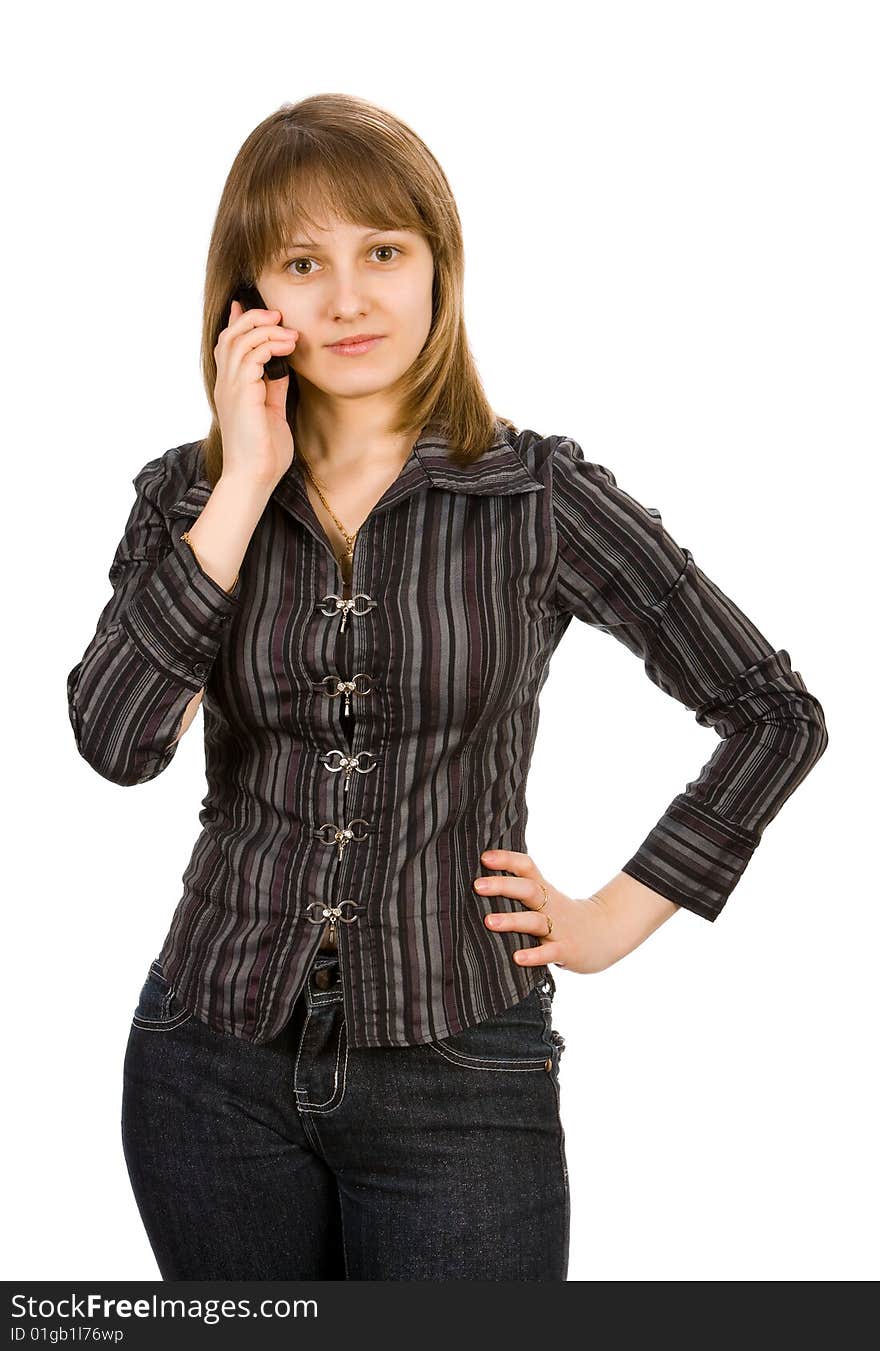 Beautiful girl with a mobile phone. Isolated on white.