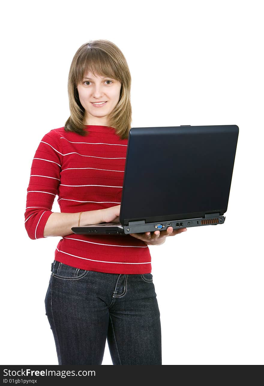 Beautiful casual girl with a laptop. Isolated on white.