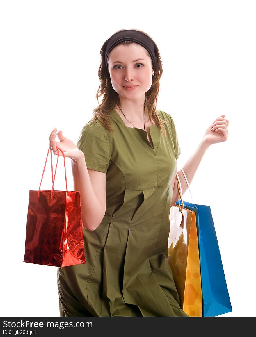 Girl with shopping bags. Isolated on white