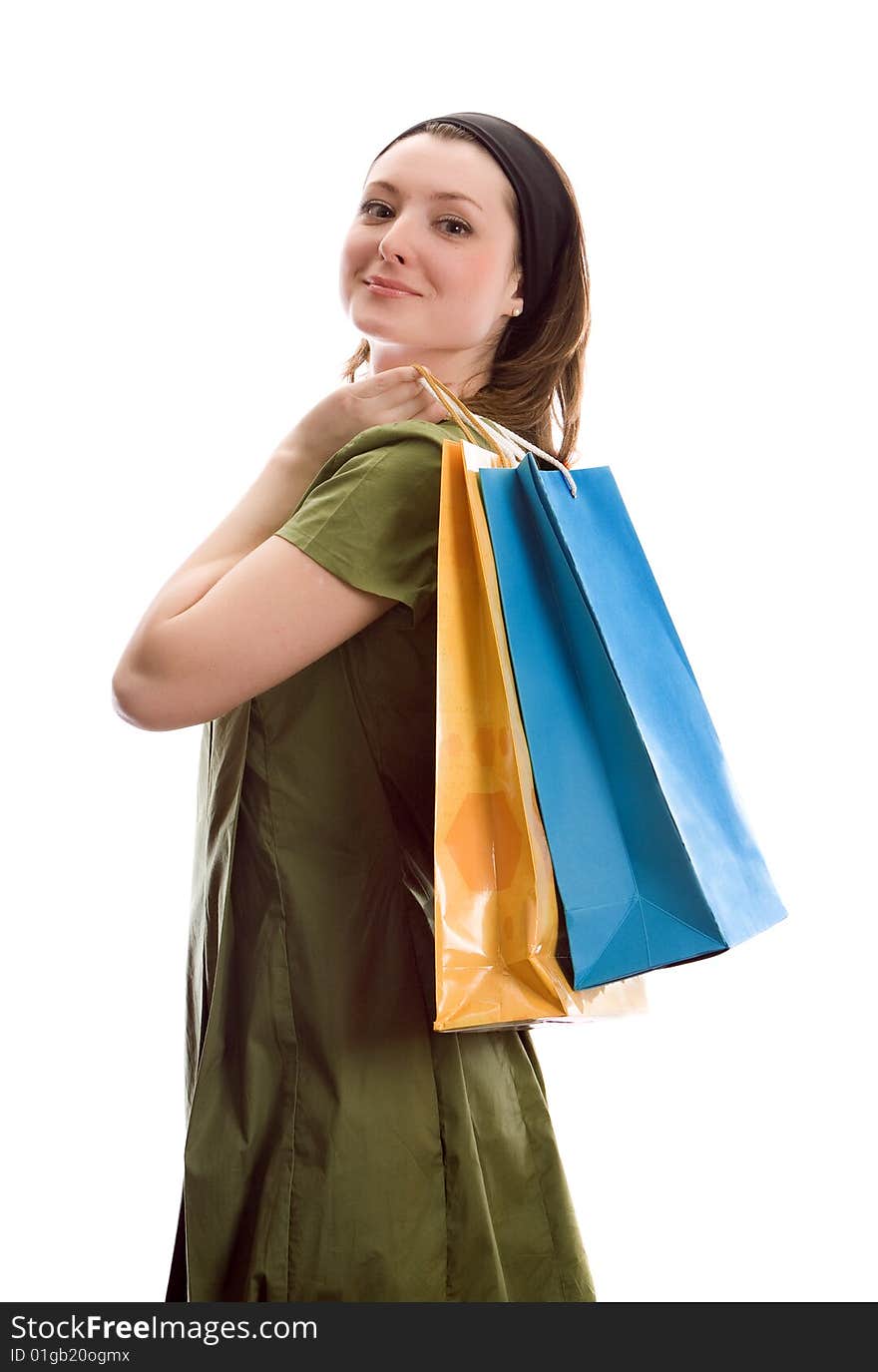 Girl with shopping bags. Isolated on white