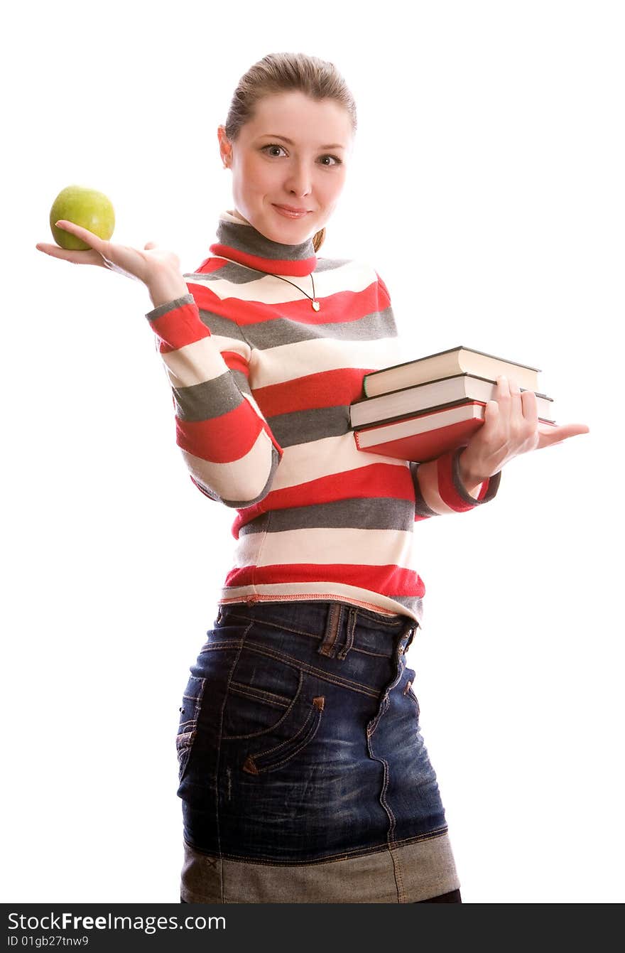 Young girl with book and apple. Isolated on whit