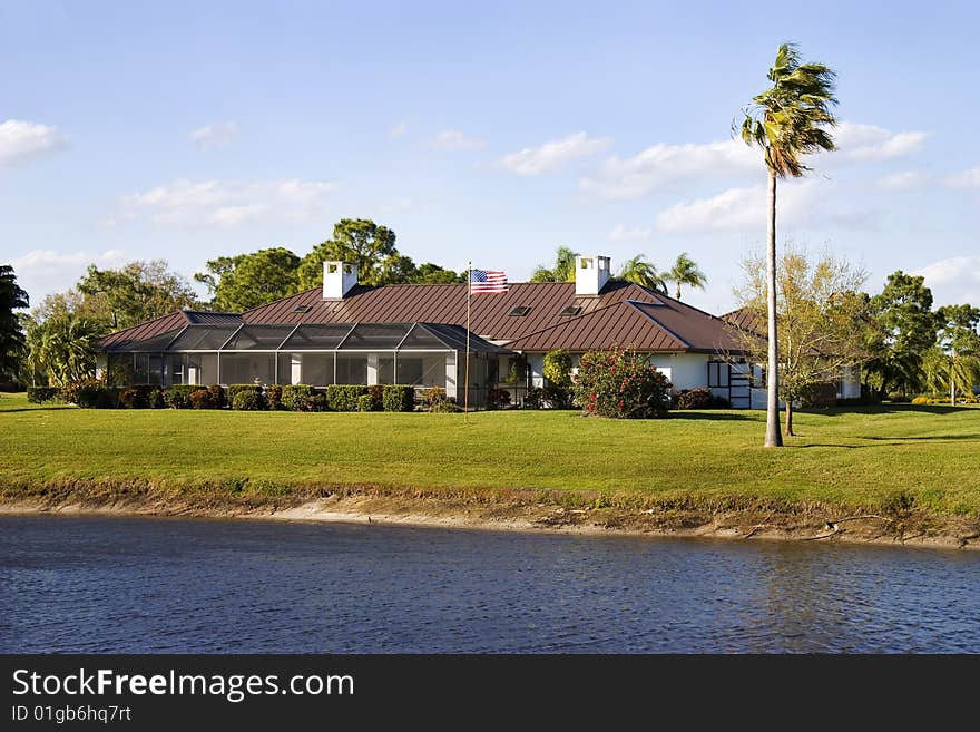 Beautiful Florida golf resort home as seen from the fairway