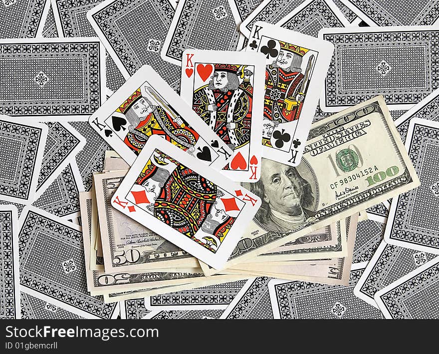 Playing cards and American dollars. Playing cards and American dollars