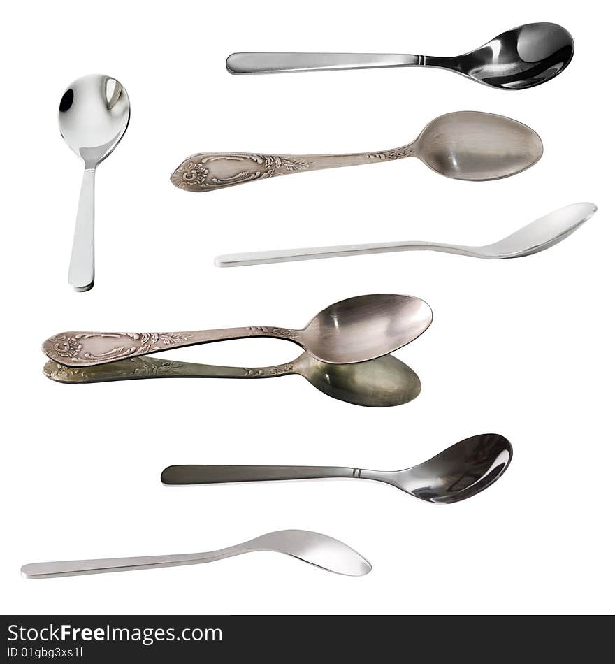 Group of teaspoons isolated over white