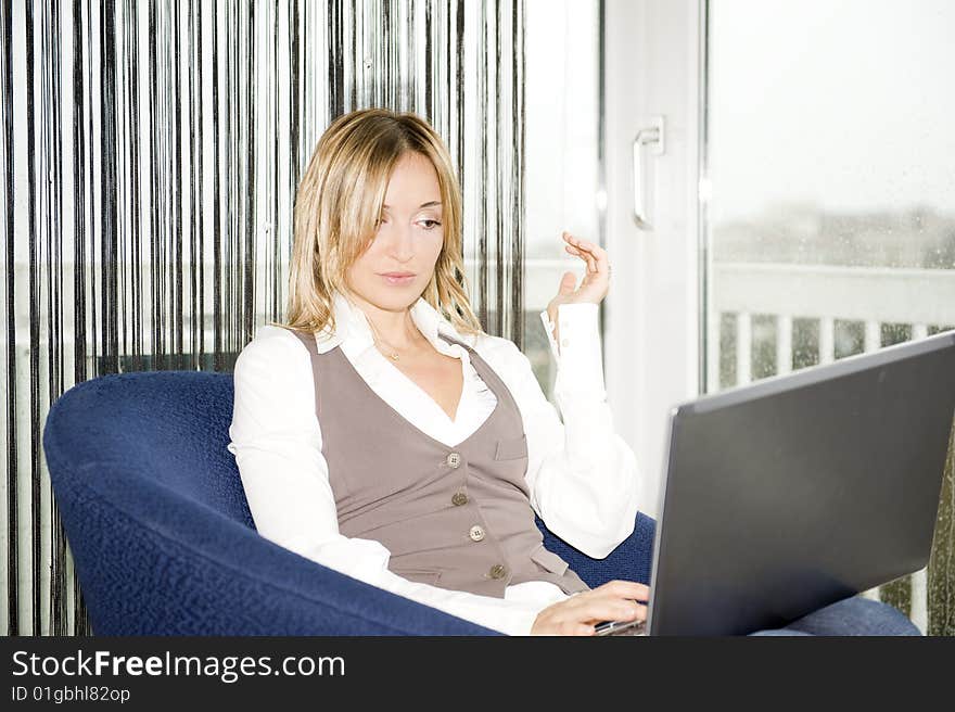 Beautiful businesswoman working at home