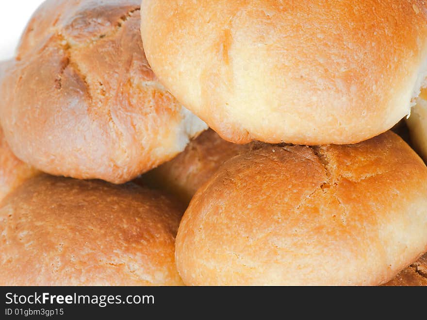 Fresh small bread on a light background. Fresh small bread on a light background