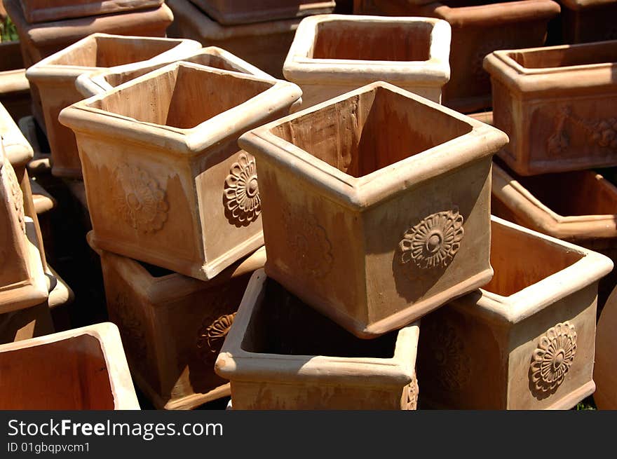 Heap of square clay vases