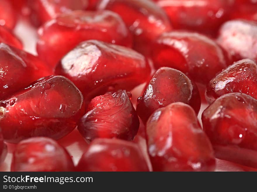 Grains of ripe pomegranate. Fruit.