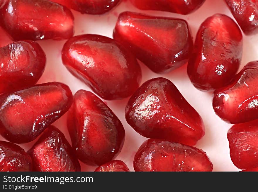 Grains of ripe pomegranate. Fruit.