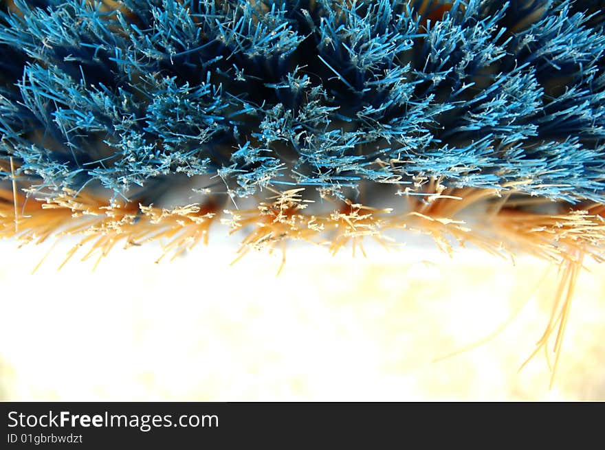 Detail of a blue broom on the ground