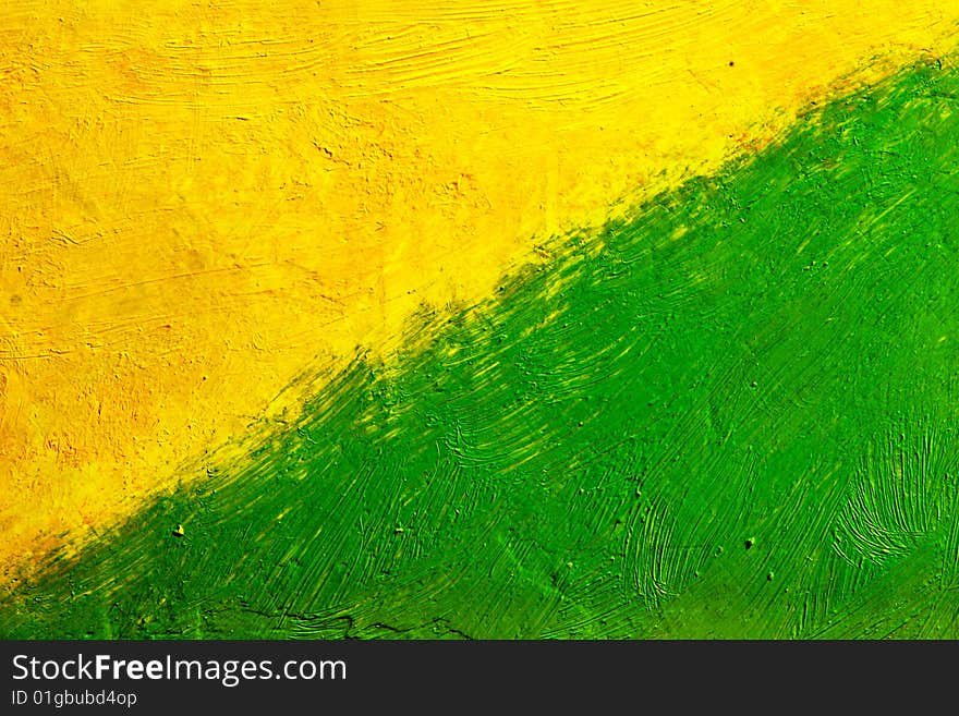 Painted canvas (green and yellow colors on rough surface)