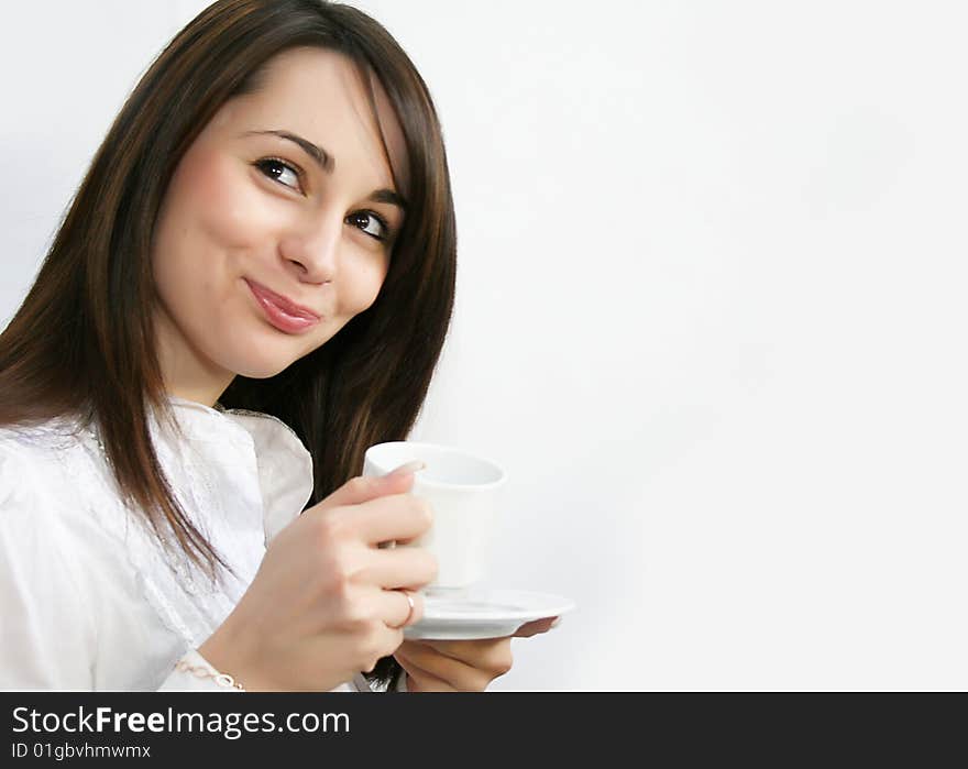 Beautiful girl white cup of coffee