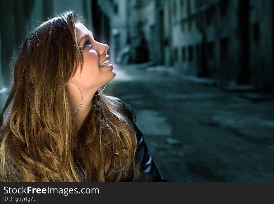 Portrait of the girl in a court yard