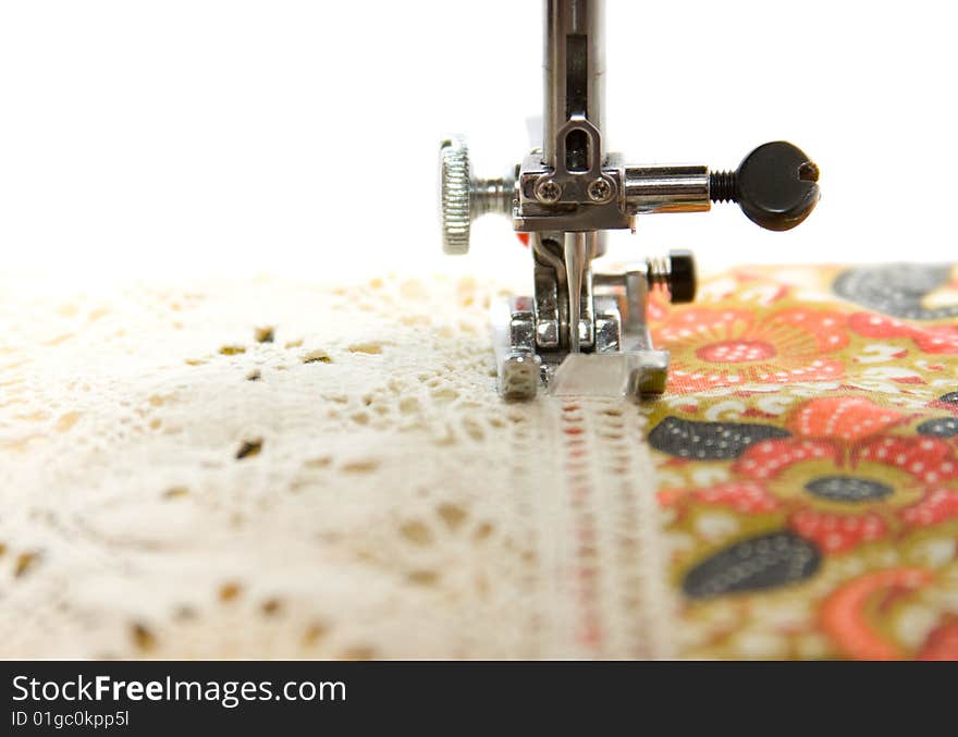 Sewing machine on the white background