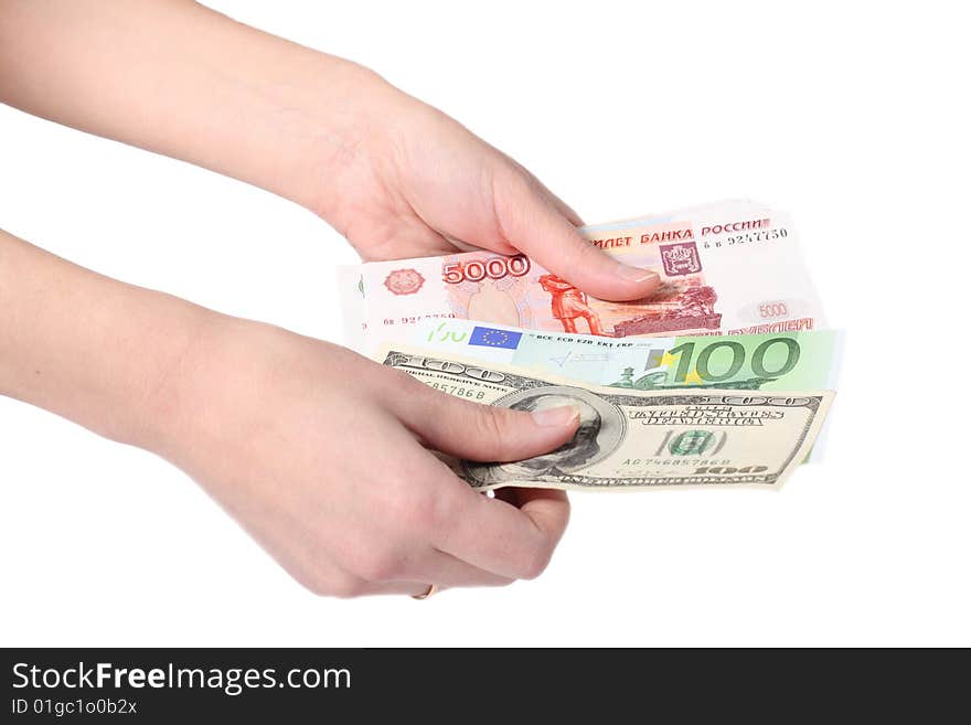 Money in hands of the woman on a white background