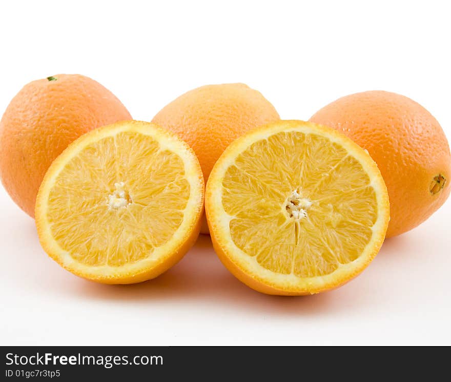 Fresh and refreshing oranges isolated over white background.