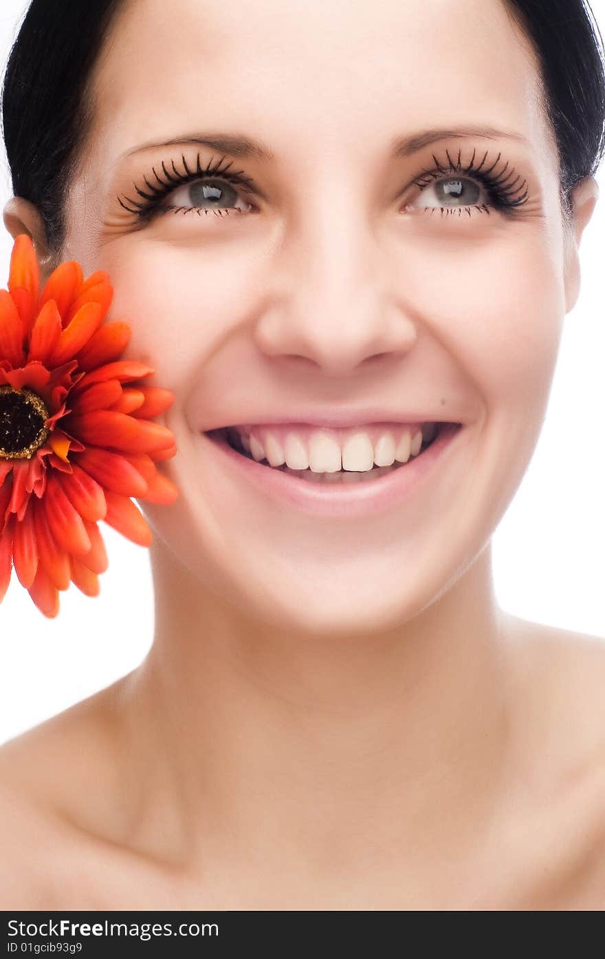 Smiling woman with flower