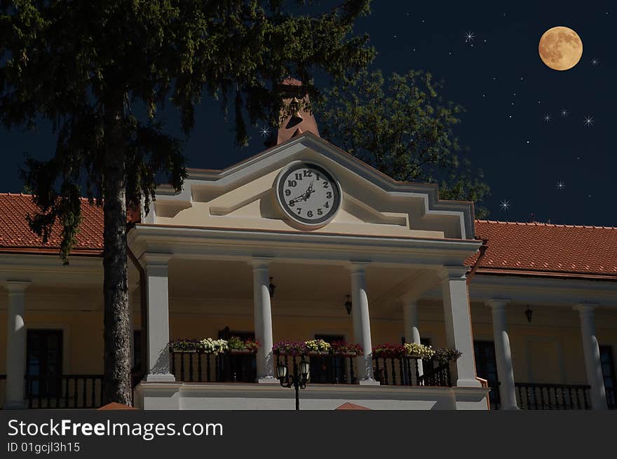 Luxury home with clock at night