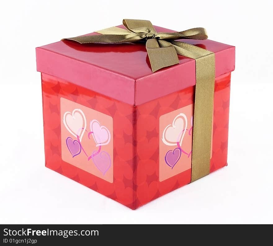 Closeup beautiful red box with hearts on it isoleted on white background. Closeup beautiful red box with hearts on it isoleted on white background