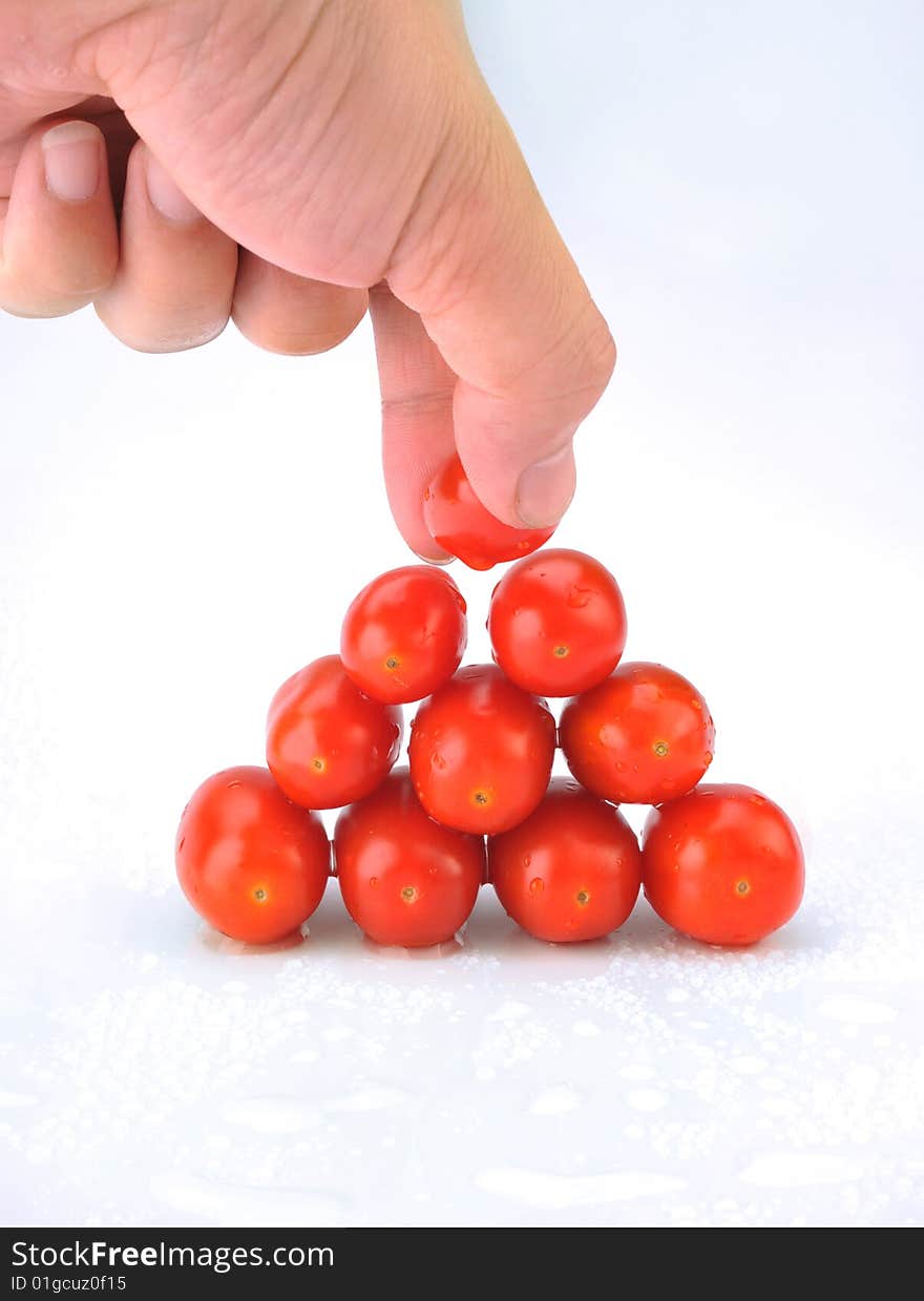 Plum tomatoes on white background. Plum tomatoes on white background.