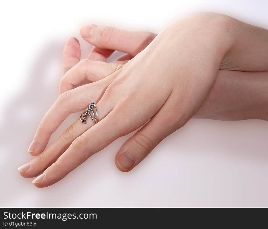 Picture of women's hands with a gold ring. Picture of women's hands with a gold ring