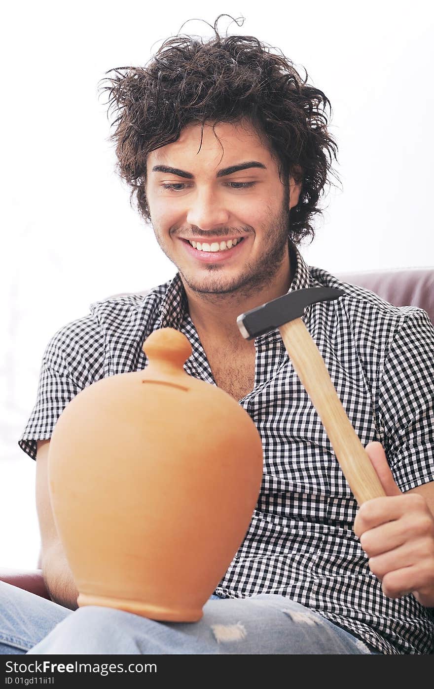 Young man with moneybox and your savings. Young man with moneybox and your savings