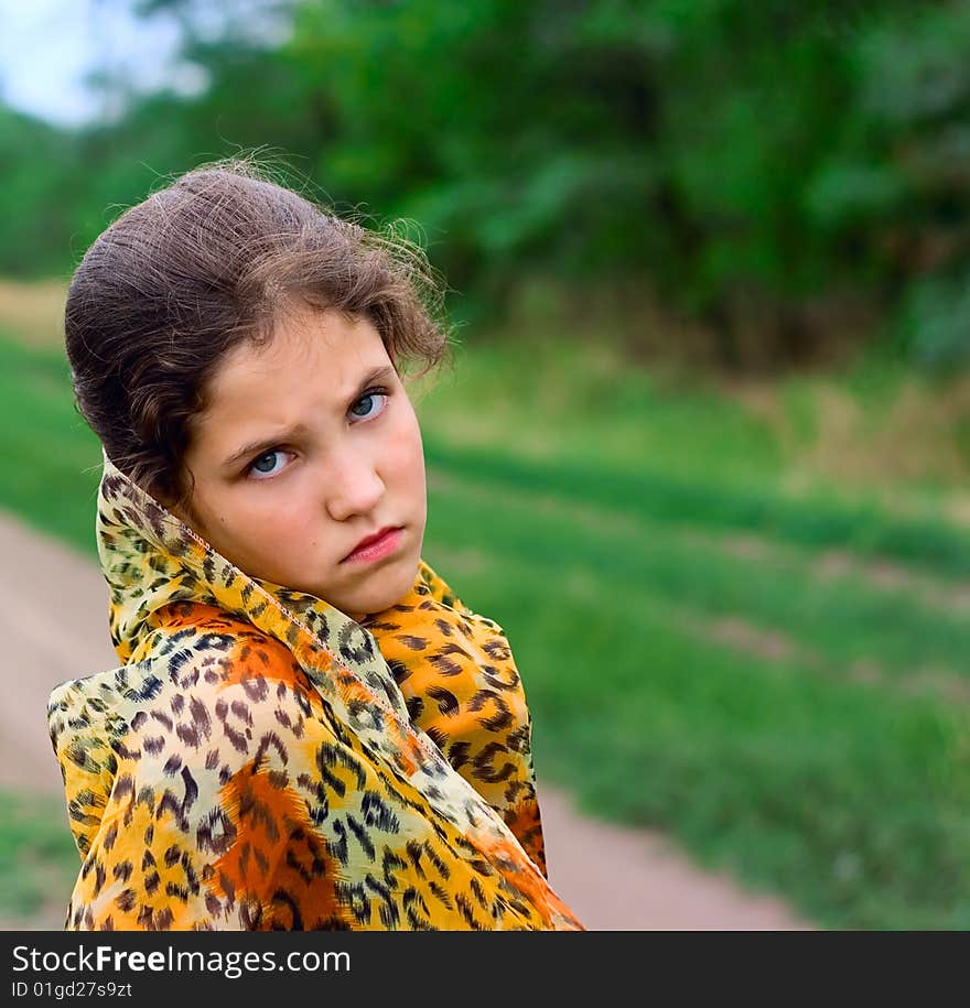 Sad teen girl outdoor on nature