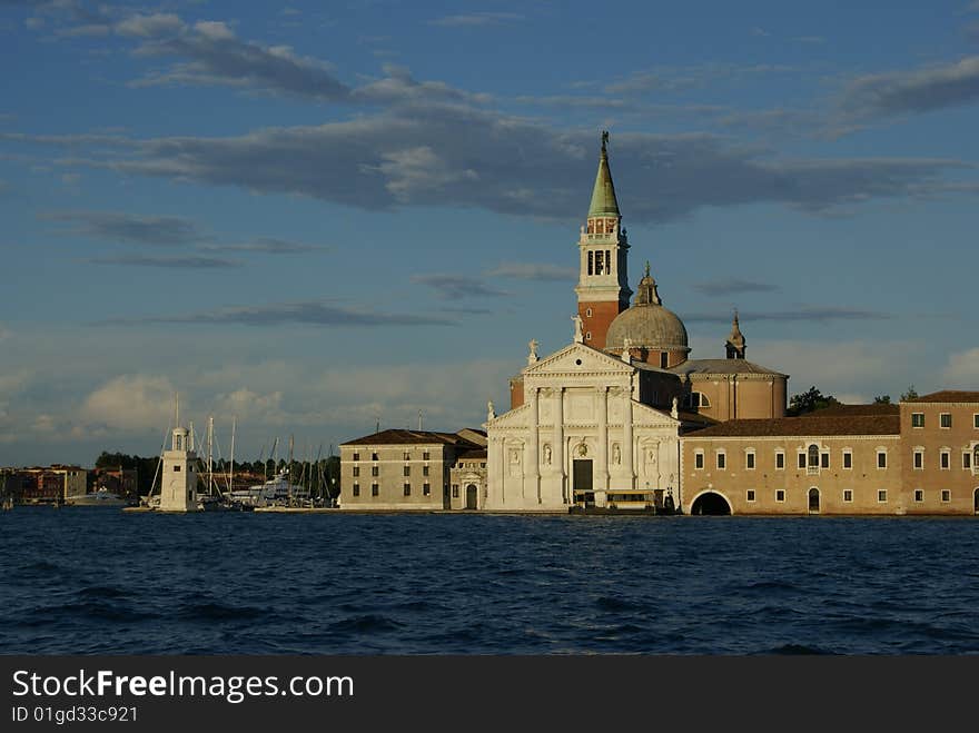 Church in Venice, Italy with dramatic cloud formations. Church in Venice, Italy with dramatic cloud formations.