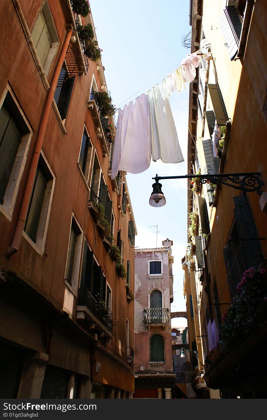 Laundry line between buildings in Venice, Italy. Laundry line between buildings in Venice, Italy.