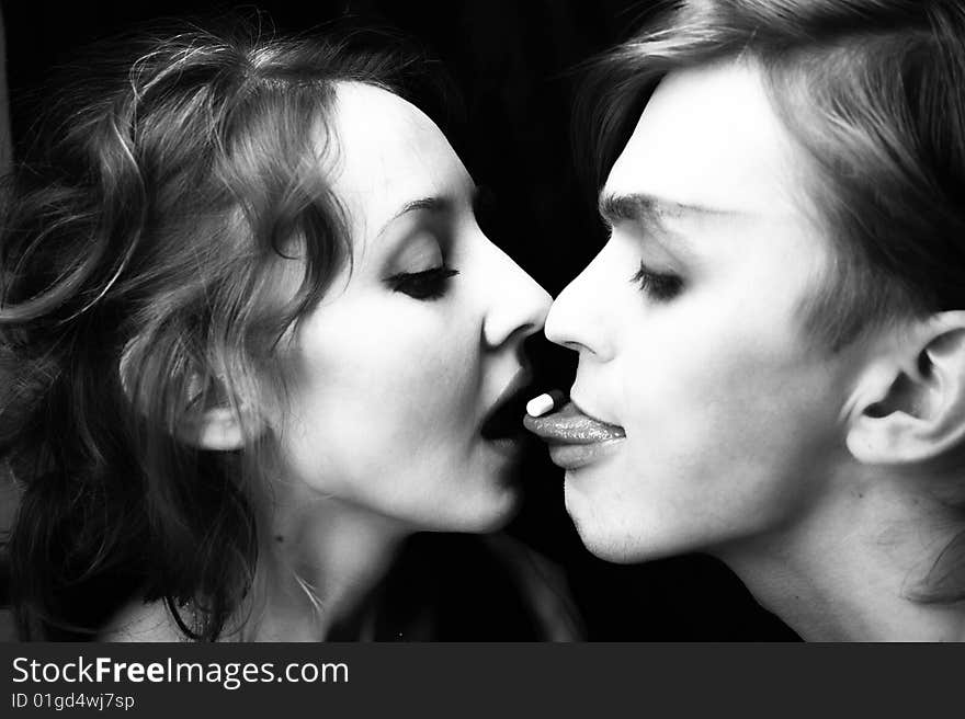 Young man and the woman with a tablet close up. Young man and the woman with a tablet close up