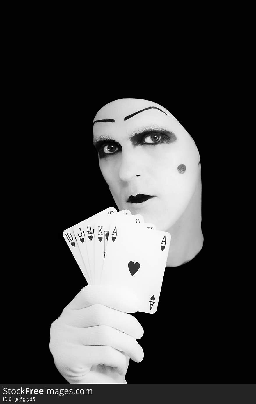 Portrait of the mime with Royal Flush on a black background