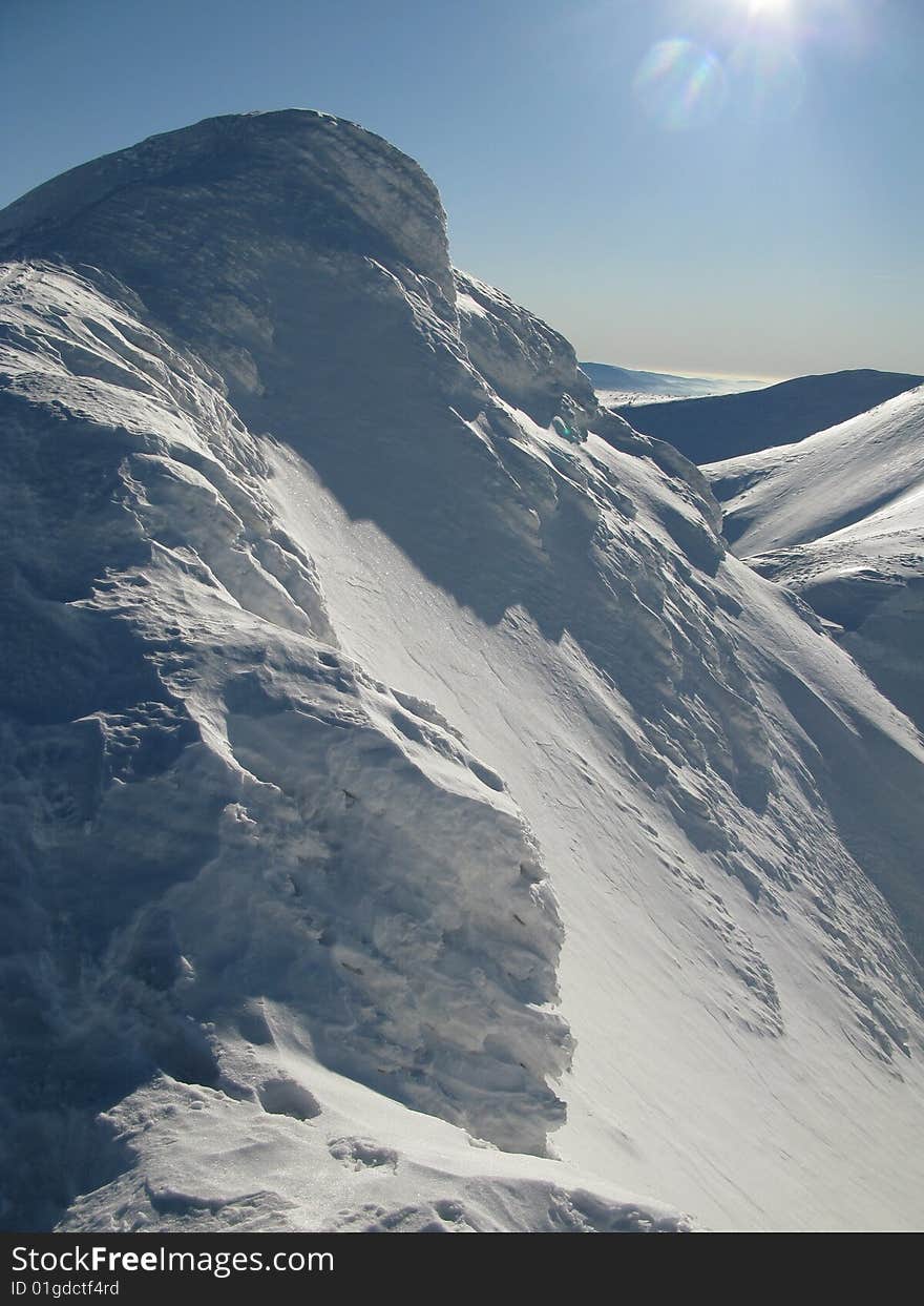 Winter - High peak on snowy mountains