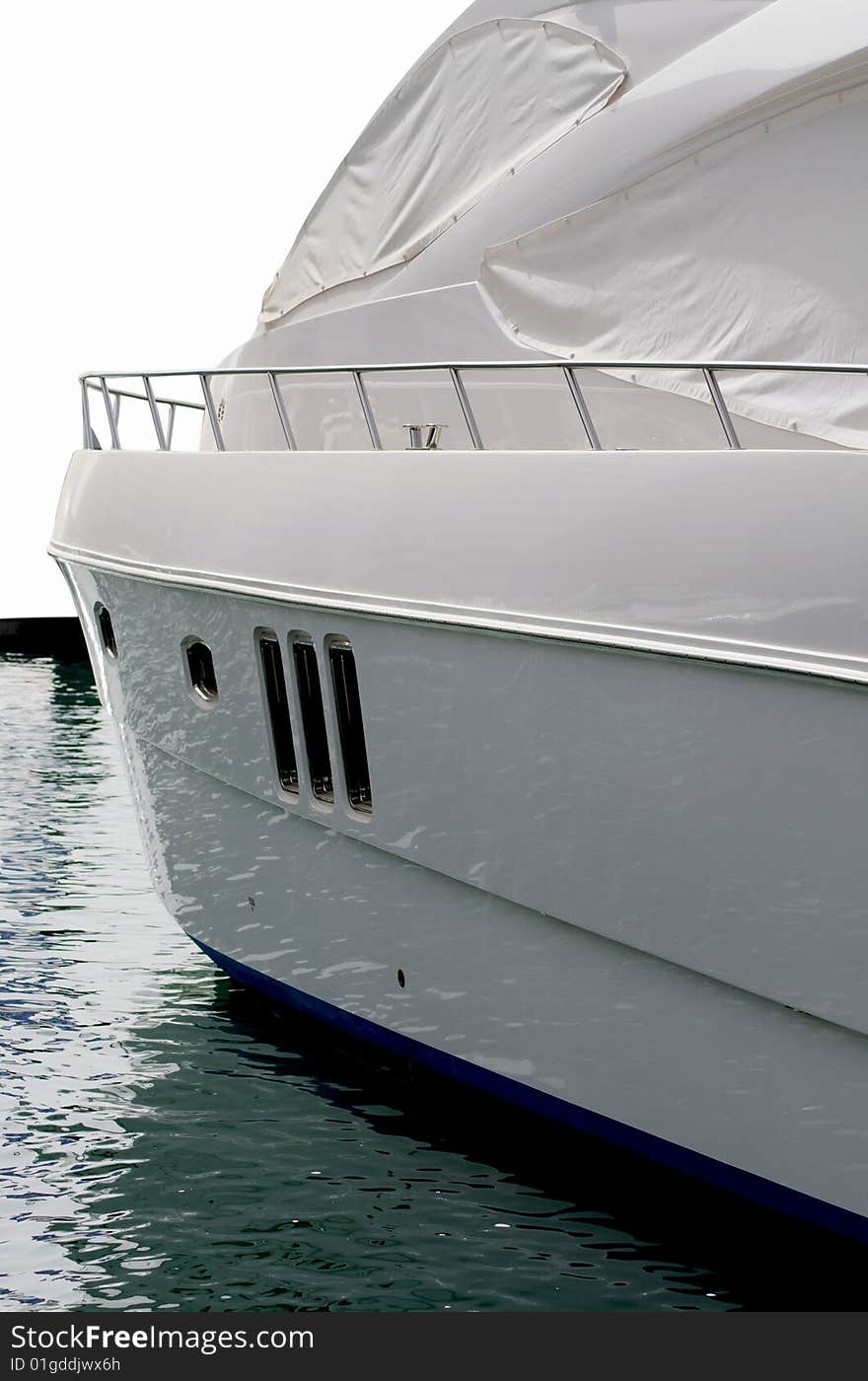 The side and front portion of the a luxurious yacht in Dubai Marina, during a boat race. The side and front portion of the a luxurious yacht in Dubai Marina, during a boat race.