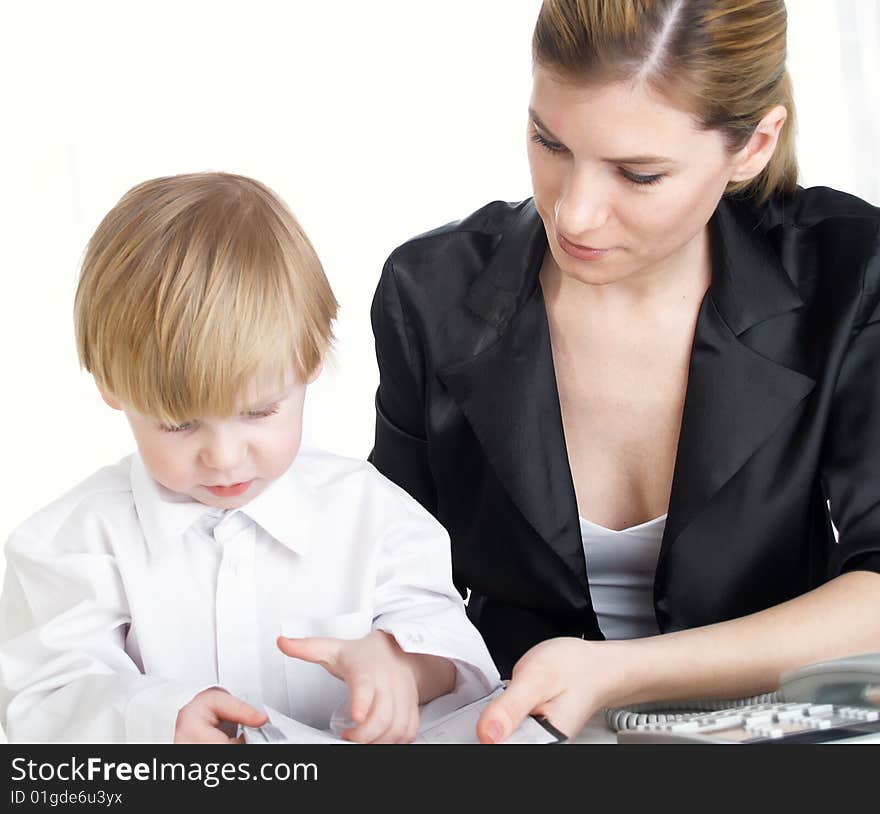 The beautiful little boy represents the businessman at office. The beautiful little boy represents the businessman at office