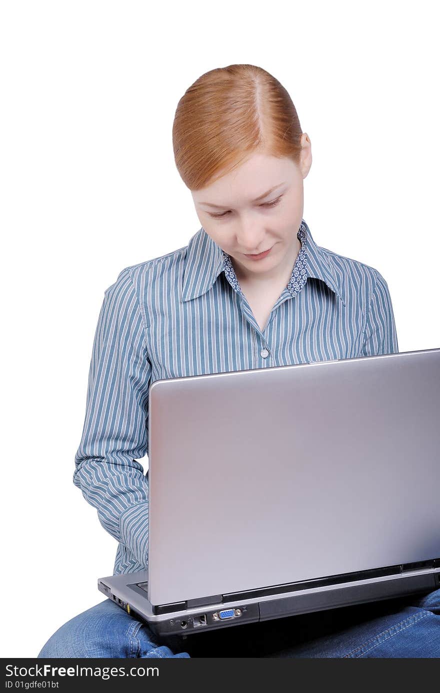 Young business woman with the laptop isolated on a white background