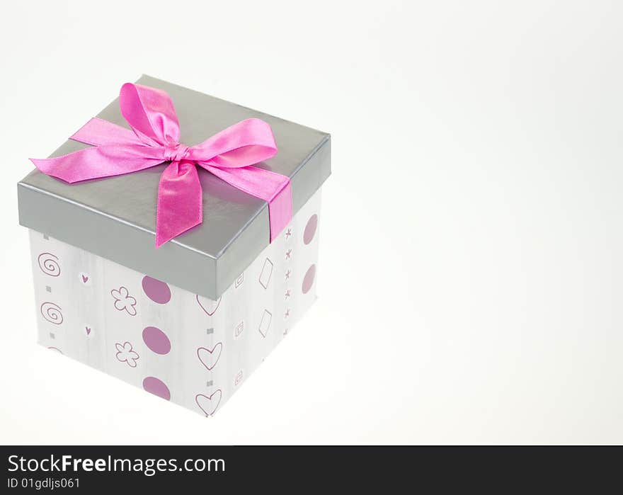 Gray gift box, isolated on white, with bow