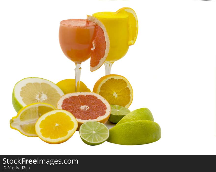 Glasses juice and citrus on a white background. Glasses juice and citrus on a white background