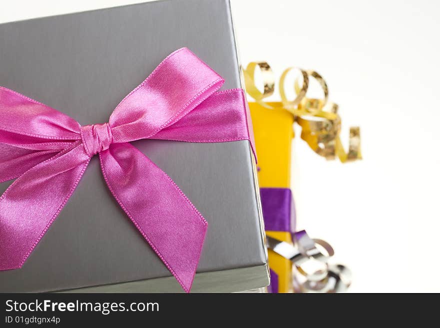 Various gift boxes on a white background, with bow and ribbon. Various gift boxes on a white background, with bow and ribbon