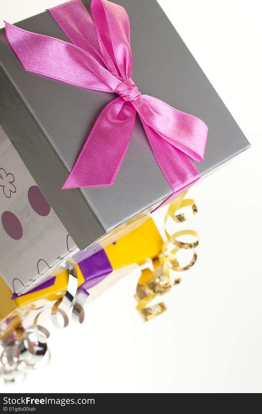 Various gift boxes on a white background, with bow and ribbon. Various gift boxes on a white background, with bow and ribbon