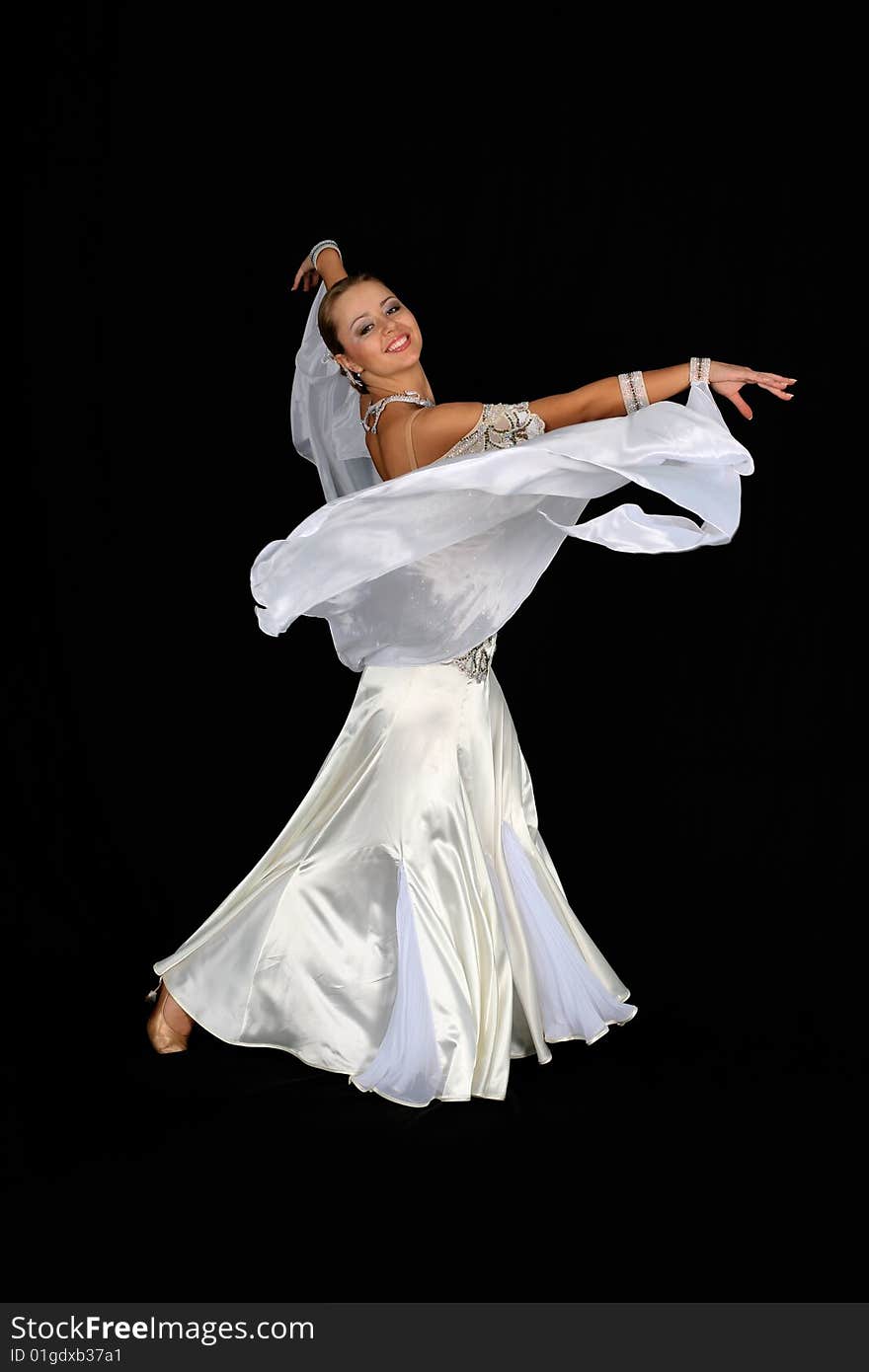 Dancer in classical blue-white dress isolated on black