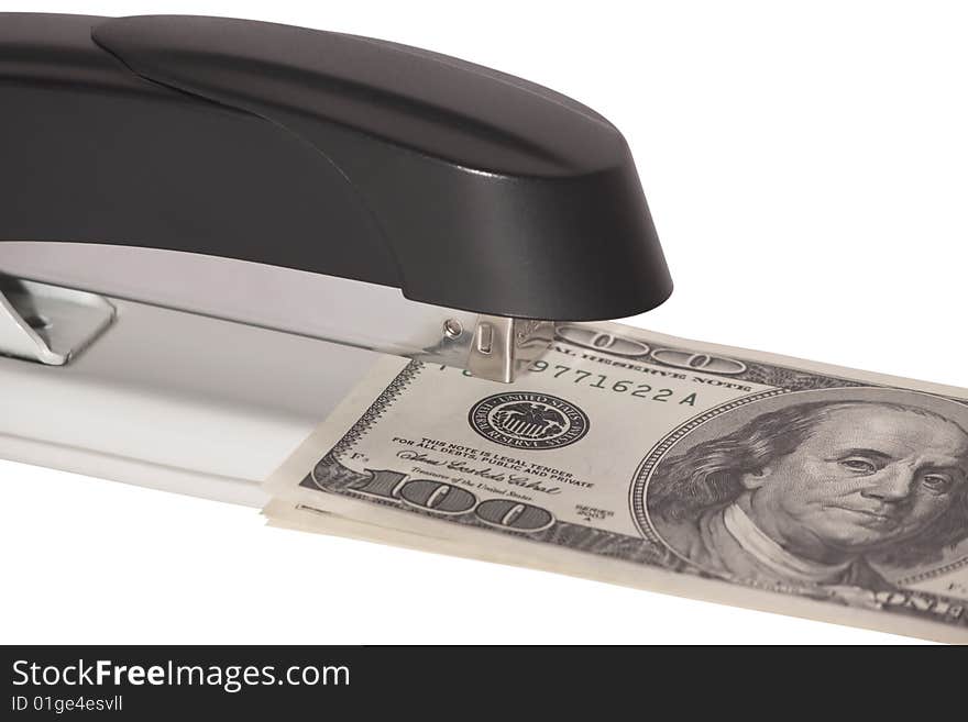 Stapler with stack of dollars isolated on white background. Stapler with stack of dollars isolated on white background