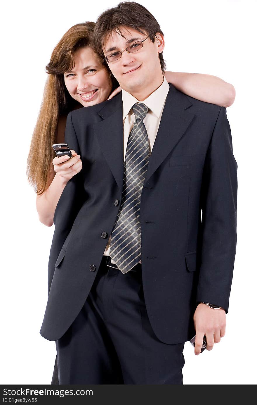 Young couple talking on the phone isolated on white