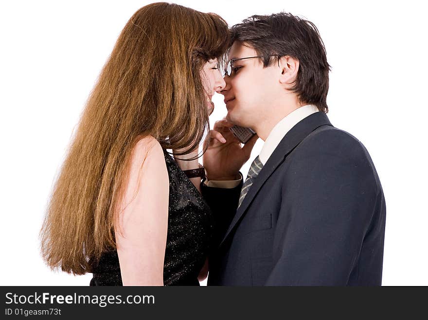 Young couple talking on the phone isolated on white