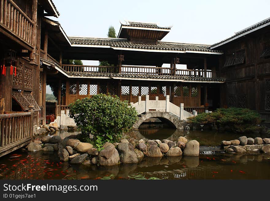 This is a chinese house. it have cistern and bridge. it in chinese guilin.