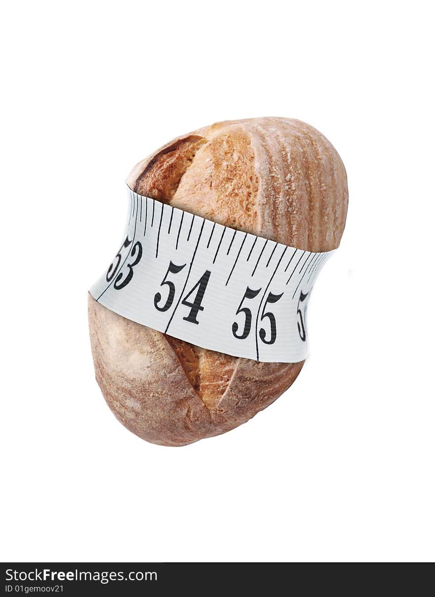 Bread with tape measure on white