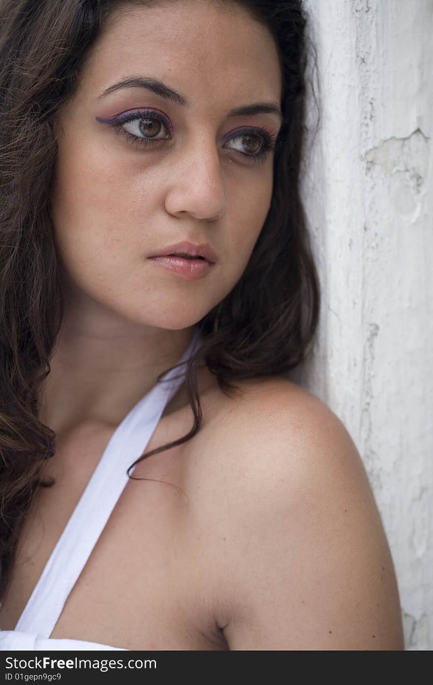 Brunette wearing a white dress