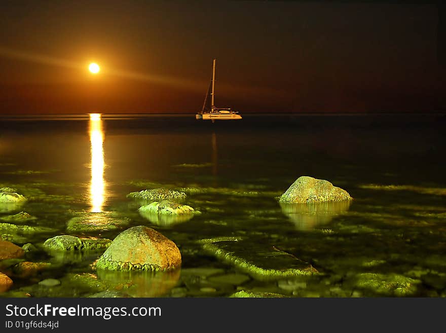 Night landscape with yacht and moon