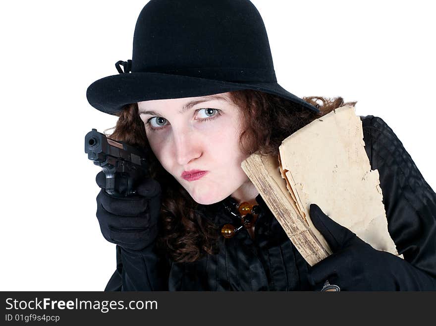 Girl in hat with old book and gun isolated on white. Girl in hat with old book and gun isolated on white